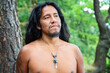 © marbenzu - Young native american man in the forest with crystal quartz necklace