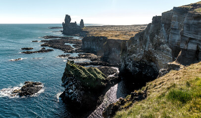Leinwandbilder - Famous Icelandic view. Londrangar basalt rocks formation on coastline of Snaefellsnes peninsula in western Iceland, Snaefellsnes National Park. Amazing natural background. Picture of wild area