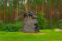 Old Wooden Windmill In The Riga Open-air Ethnographic Museum.