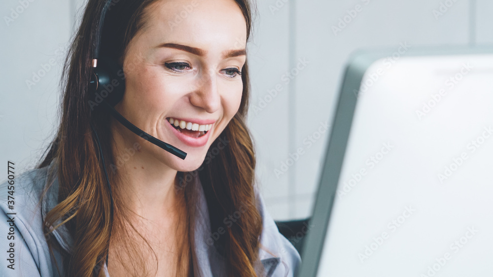 Business people wearing headset working in office to support remote customer or colleague. Call center, telemarketing, customer support agent provide service on telephone video conference call. - obrazy, fototapety, plakaty 