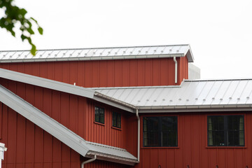 modern standig seam metal roof with roof window, fume hoods snow guard rain gutter