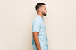 © Asier - Young south-asian man gazing left, sideways pose.