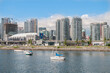 © Victor - Vancouver, British Columbia /Canada Jul-25-2014 > False Creek surrounded by buildings and boats on a sunny summer morning
