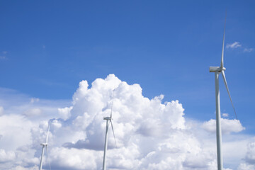 The wind turbines used to generate electricity provide clean energy to the earth on clear days