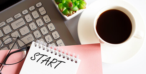 Poster - Office supplies, devices, coffee cup and glasses on the white table with text START