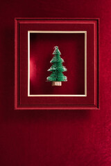 Aufkleber - Merry Christmas and happy new year text and Christmas tree in felt photo frame on velvet red felt fabric  top view background