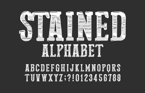 Stained alphabet font. Messy vintage letters, numbers and symbols. Vector typescript for your typography design.