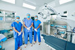 © DragonImages - Ophthalmic surgical team in scrubs ready for performing laser vision correction