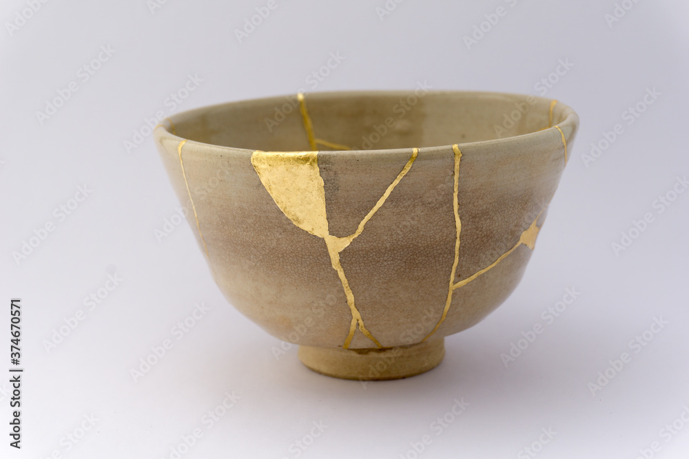 Kintsugi beige tea ceremony chawan bowl. Gold cracks restoration on old ...