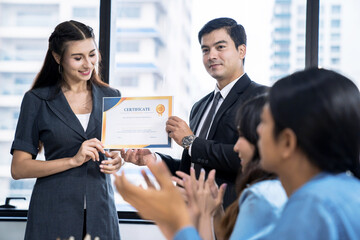 business executives congratulate employees on their excellent work, certificate of excellence or a c