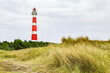 © pwollinga - Lighthouse in a rural landscape on an island in the North Sea, Ameland, Holland
