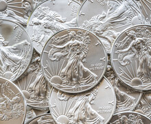 Pile Of American Silver Eagle Coins