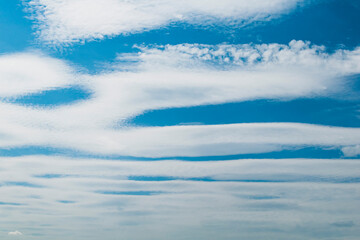 Canvas Print - White clouds in a blue Sunny sky