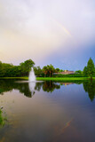Fototapeta Tęcza - Beautiful double rainbow above a lake