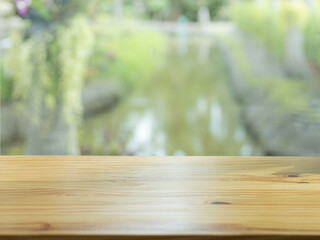 Empty white table top, counter, desk background with and blurred window background - can be used for display or montage your products