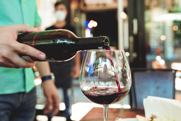 wine tasting pouring in a cafe restaurant