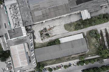 Wall Mural - aerial top view of the roofs of a warehouse buildings in an industrial estate