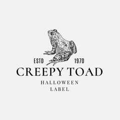 Wall Mural - Premium Quality Halloween Logo or Label Template. Hand Drawn Creepy Toad or Frog Sketch Symbol and Retro Typography.