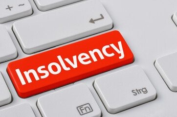 Wall Mural - a keyboard with a red button - insolvency
