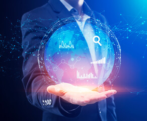 Poster - Global Business Data Management. Businessman Holding Globe Hologram With Graphs And Charts