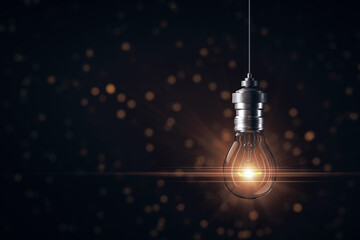 Wall Mural - Creative glowing light bulb on gray background.