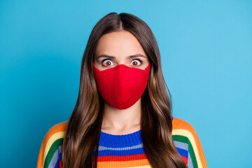 Sticker - Close up photo of astonished girl impressed covid epidemic infection information stare stupor wear pullover red medical mask isolated over blue color background