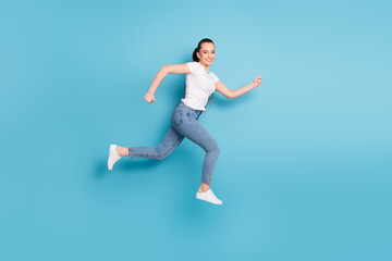 Poster - Full body profile side photo of charming girl jump run copyspace after season discounts wear good look outfit isolated over blue color background