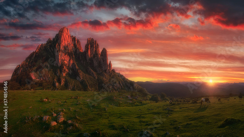 Cuadros en Lienzo amazing landscape of Itxina mountain peak at sunset