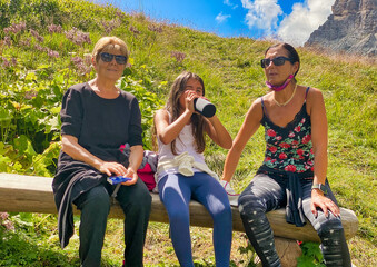 Wall Mural - Three generations female on a mountain excursion