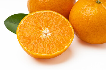 Orange sliced and leaves on white background , Mandarin or tangerine fruits