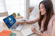 © weedezign - Asian woman ask chat bot function in app on laptop screen looking for customer support online shopping shop with apps,digital marketing concept,artificial intelligence (ai) system