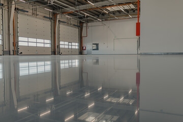 Epoxy and waxed flooring with colorful signage.