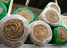 Rolls Of Mineral Wool Lie On The Rack