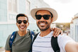 © kleberpicui - Two happy male tourists taking self portrait. Travel and love concept in Latin America