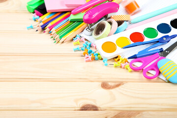 Wall Mural - School supplies on brown wooden table