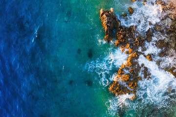 Wall Mural - mediterranean sea. aerial view on the water and rocks during sunset. vacation and adventure. beach a