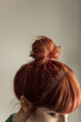 © Jen Grantham Photography/Stocksy - Close up of young woman with red hair