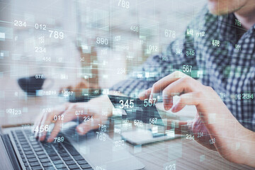 Aufkleber - Double exposure of man hands holding a credit card and data theme drawing. E-commerce and technology concept.