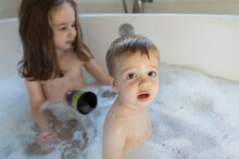 Cute Boy Toddler Playing In A Bathtub
