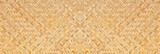 Traditional handcraft woven bamboo texture for banner, weave wood pattern background.