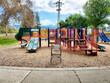 © Monica Murphy/Stocksy - Suburban playground shut down due to pandemic