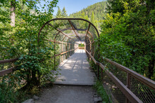 Bridge Crossing On The Trail To Kootenai Falls Waterfall In Montana