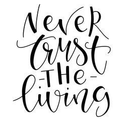 Wall Mural - Never trust the living - hand drawn lettering isolated on white background, vector illustration.