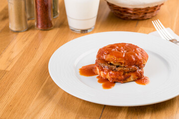 Delicious Turkish islak hamburger or wet burger on wooden table