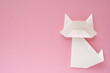 © Akira Ito - white origami cat on pink background