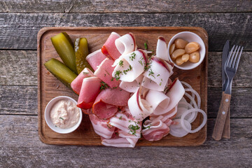 Wall Mural - Assorted of lard with marinated cucumbers, garlic and onion. Top view