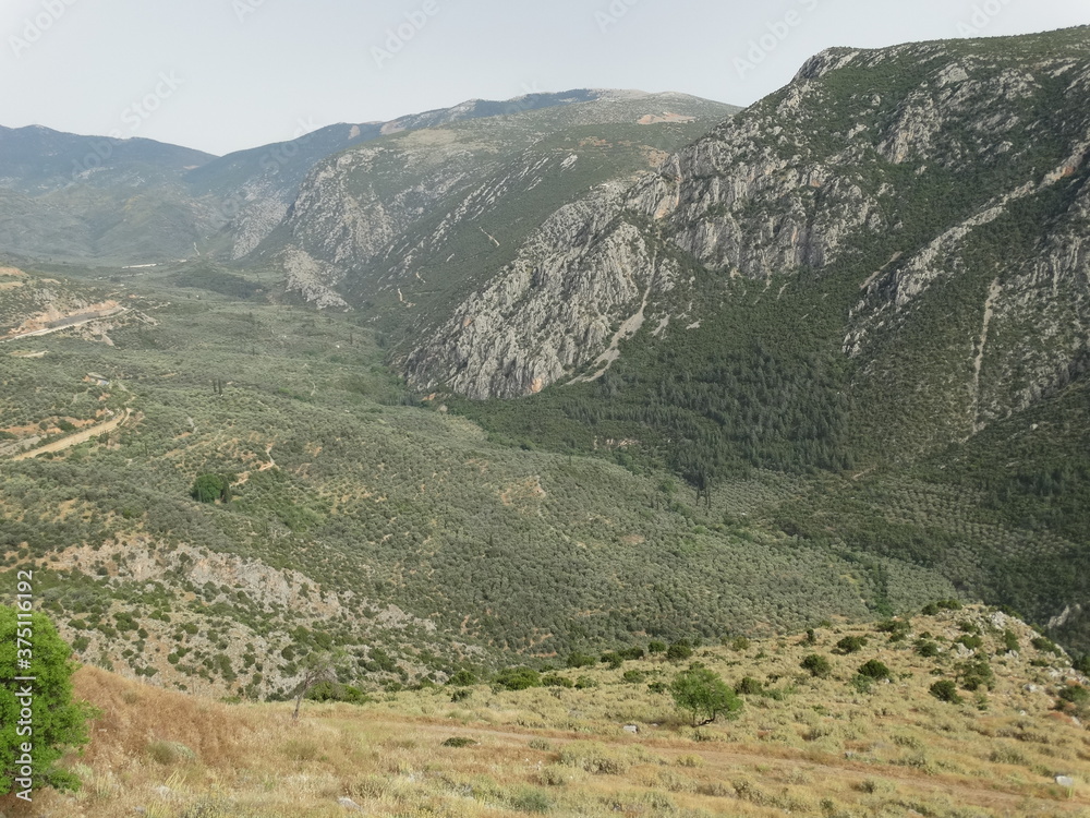 Landscape of ancient sanctuary Delphi, also called Python, in Greece ...