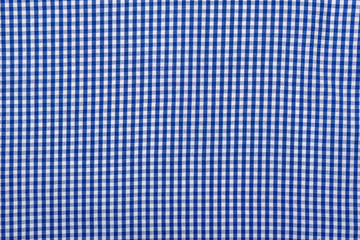 Wall Mural - Blue checkered textile, part of checkered shirt, top view as background or texture