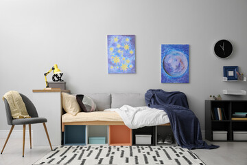 Poster - modern teenager's room interior with comfortable bed and stylish design elements