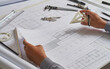 © Chaosamran_Studio - Architect engineer contractor design working drawing sketch plan blueprint and making architectural construction house building in architect studio.